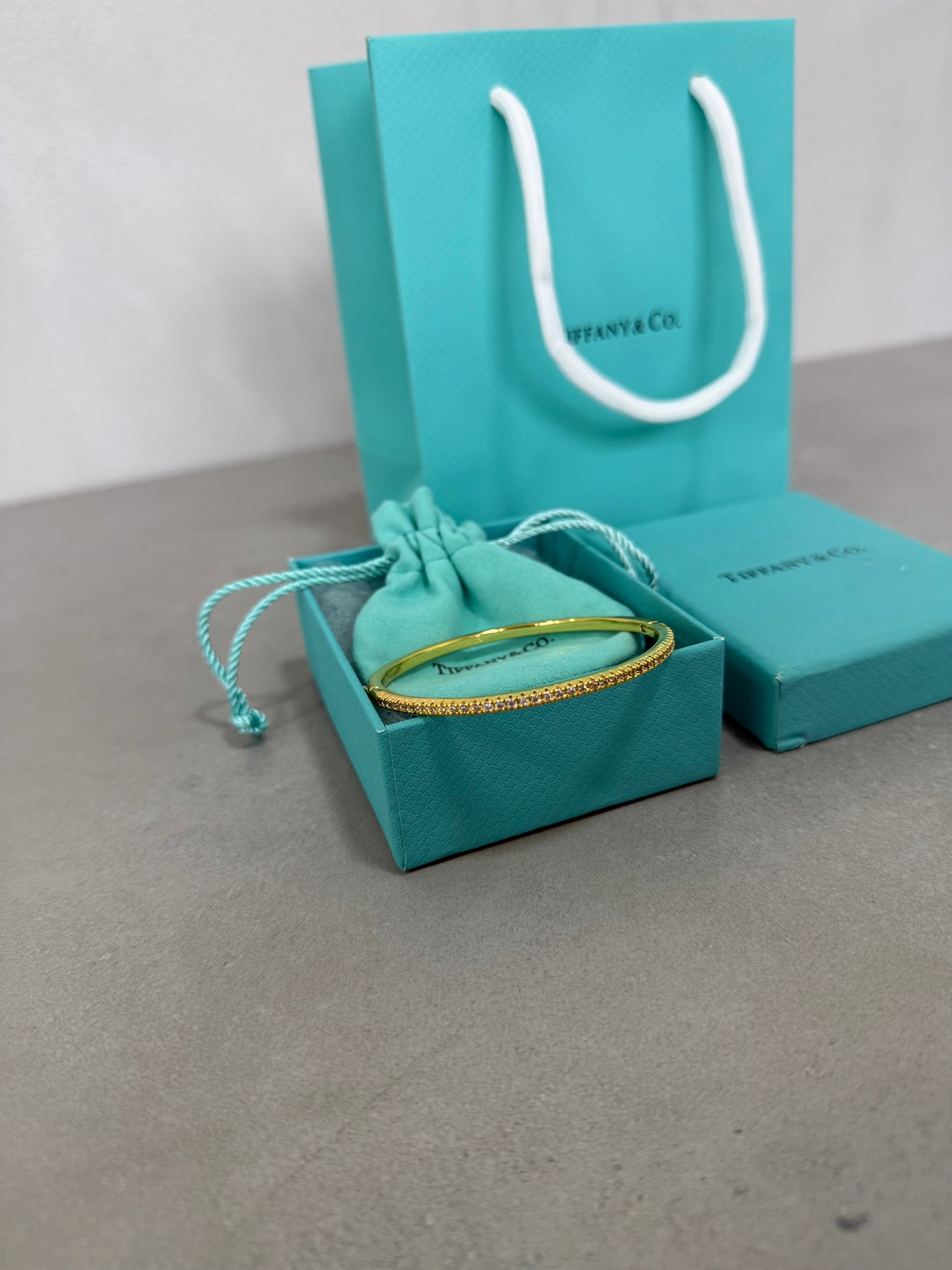 Pulsera TIF dorada -5189