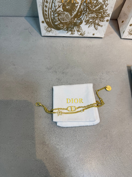 Pulsera CD dorado con estrella