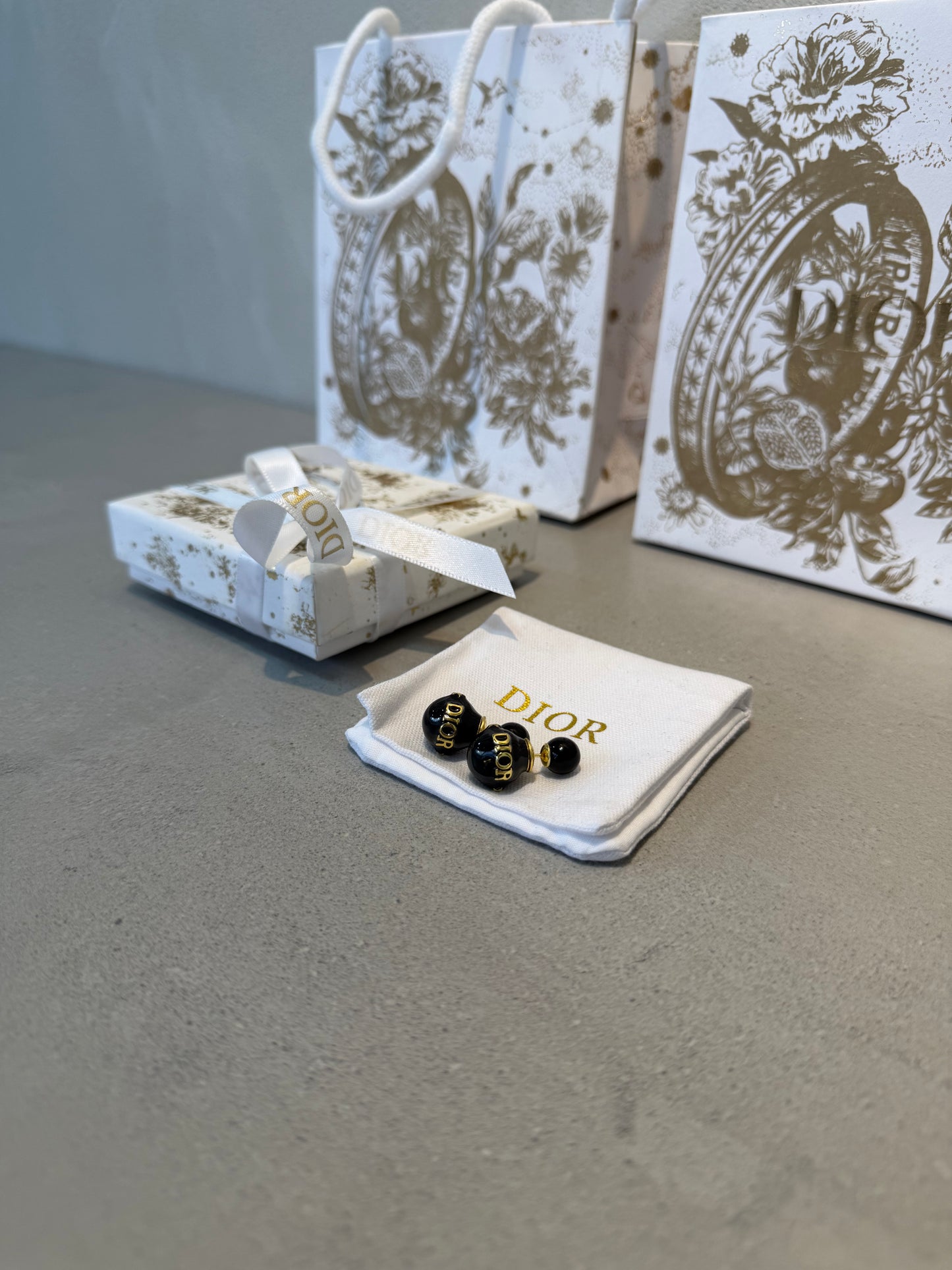 Aretes CD perla negra