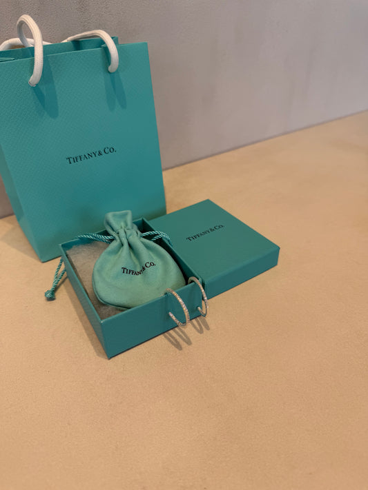 Aretes TIF plateados