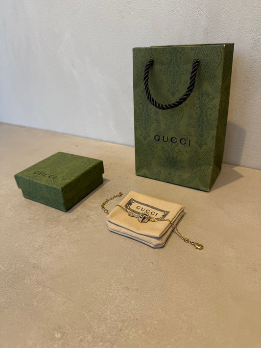 Pulsera GG llave dorada diamantes rosa