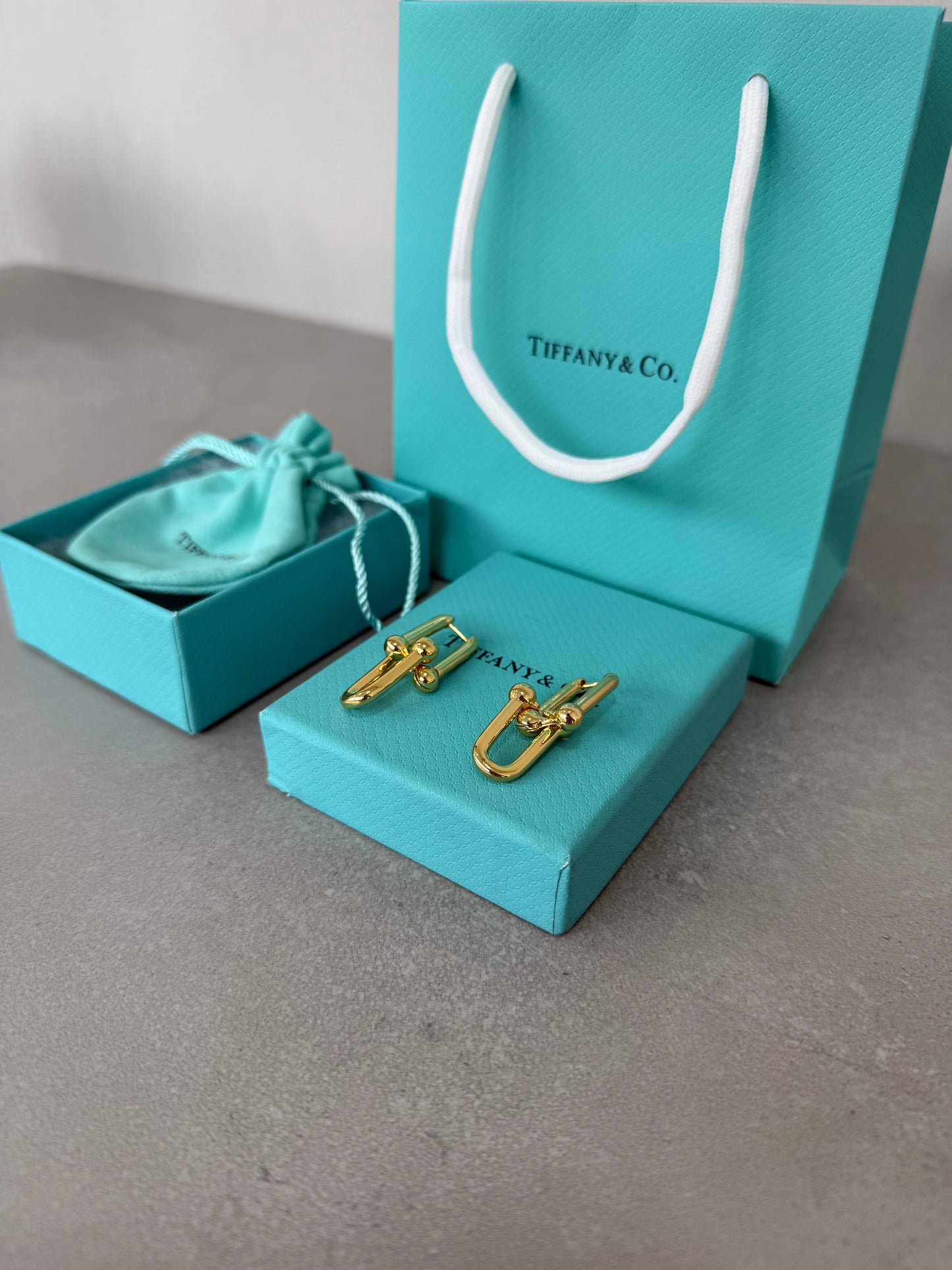 Aretes TIF dorado -5185