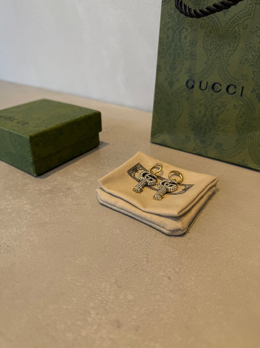 Aretes GG llave con diamantes