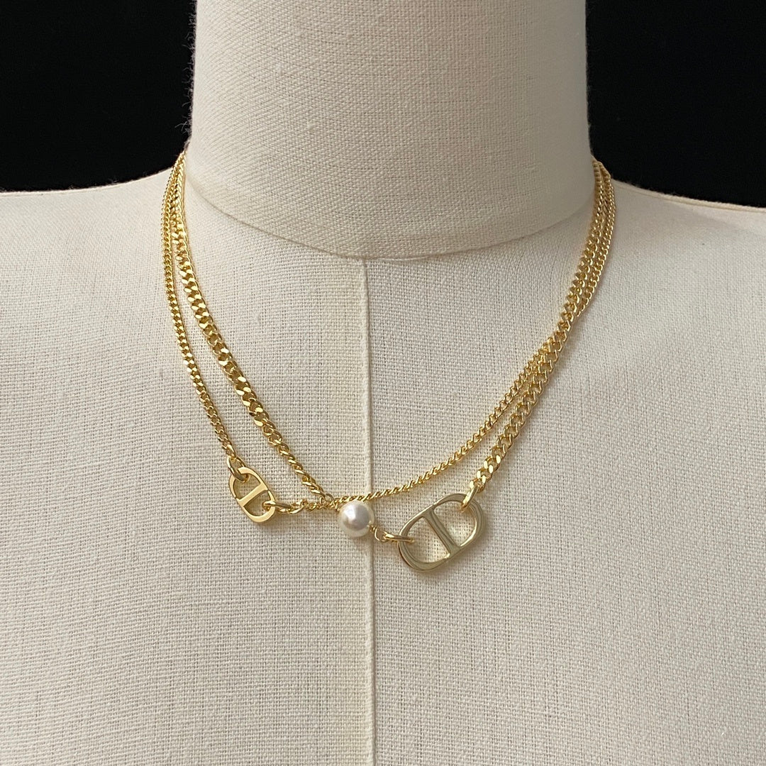 Collar CD dorado y perla -5042