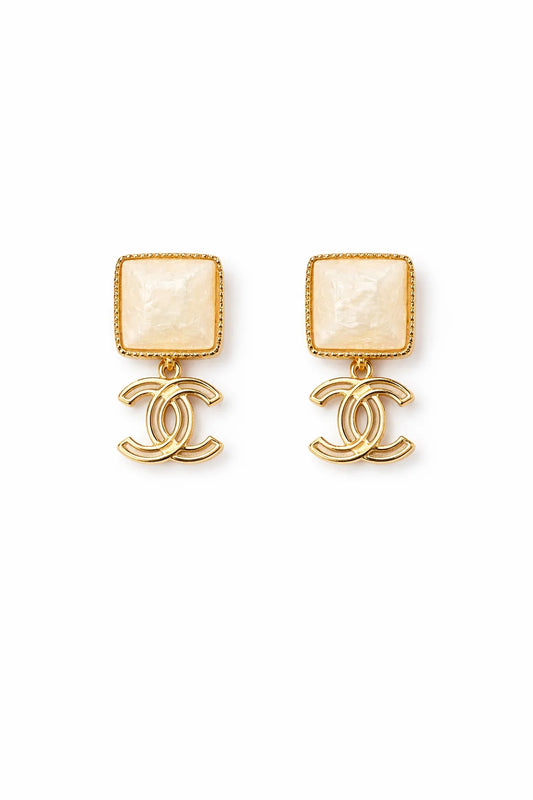 Aretes CC logo blanco -5094