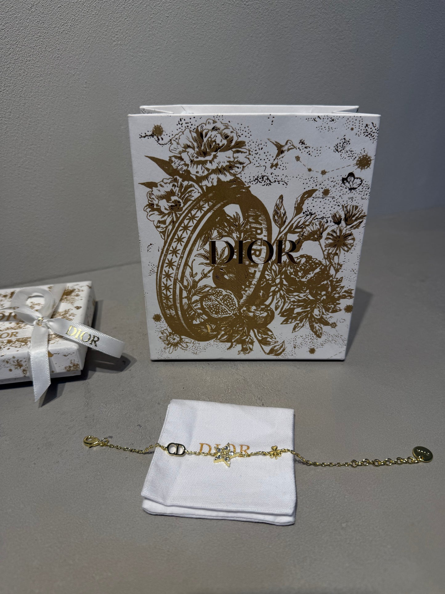 Pulsera CD dorada estrella y perla - 5564