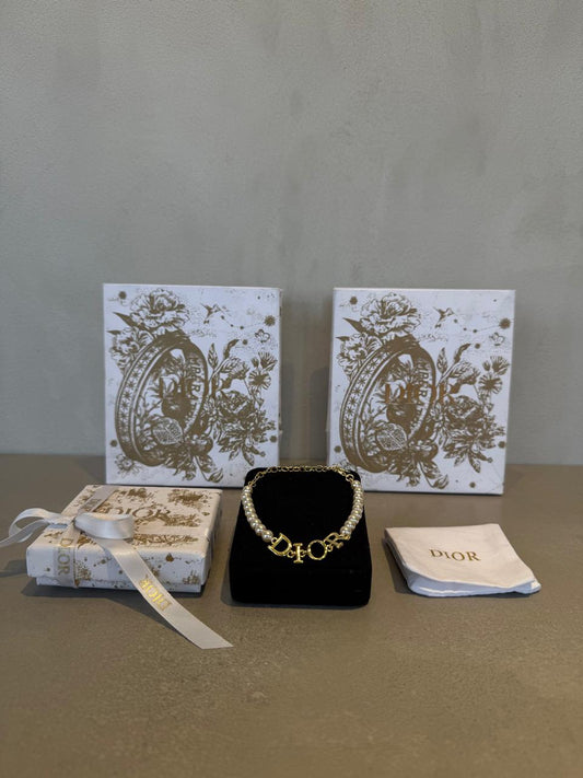 Pulsera CD dorada con perlas 5661